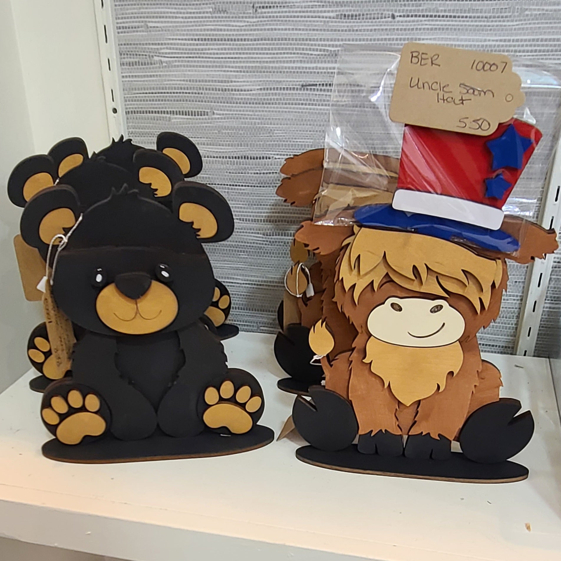 Wood Standing Bear and Highland Cow